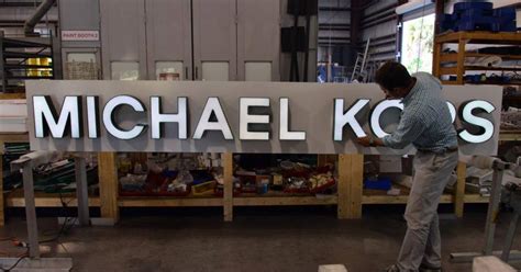 michael kors profits.